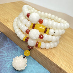 Lotus Bodhi Seed Mala 108 Beads - white carved lotus beads with amber accents, 108 bead mala