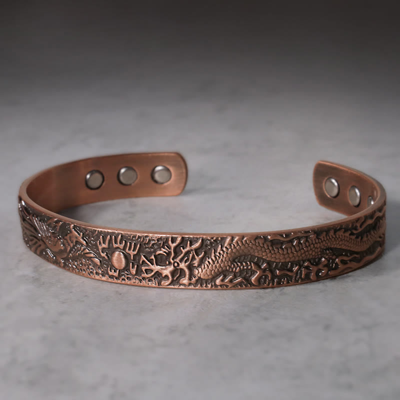 Dragon Phoenix Copper Cuff Bracelet – Intricate dragon relief on solid copper, magnetic therapy discs, Balance