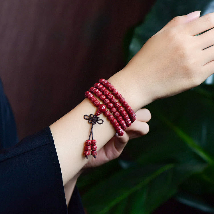 108 Mala Beads Cinnabar Bracelet – Wrapped on wrist with tassel, mala bead bracelet