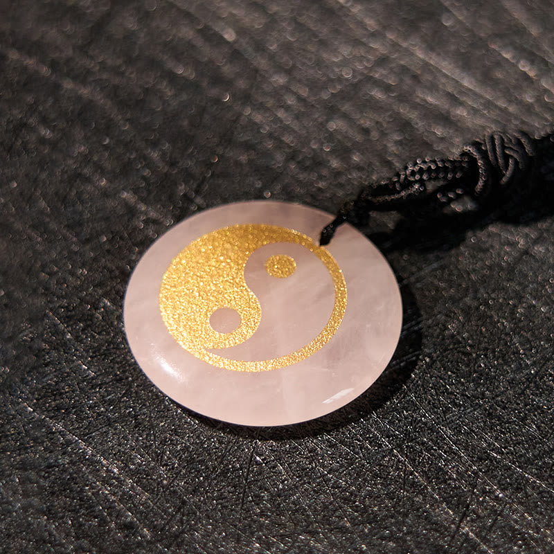 Yin Yang Crystal Necklace – Round rose quartz pendant with gold glitter yin-yang symbol, polished pink crystal with natural m