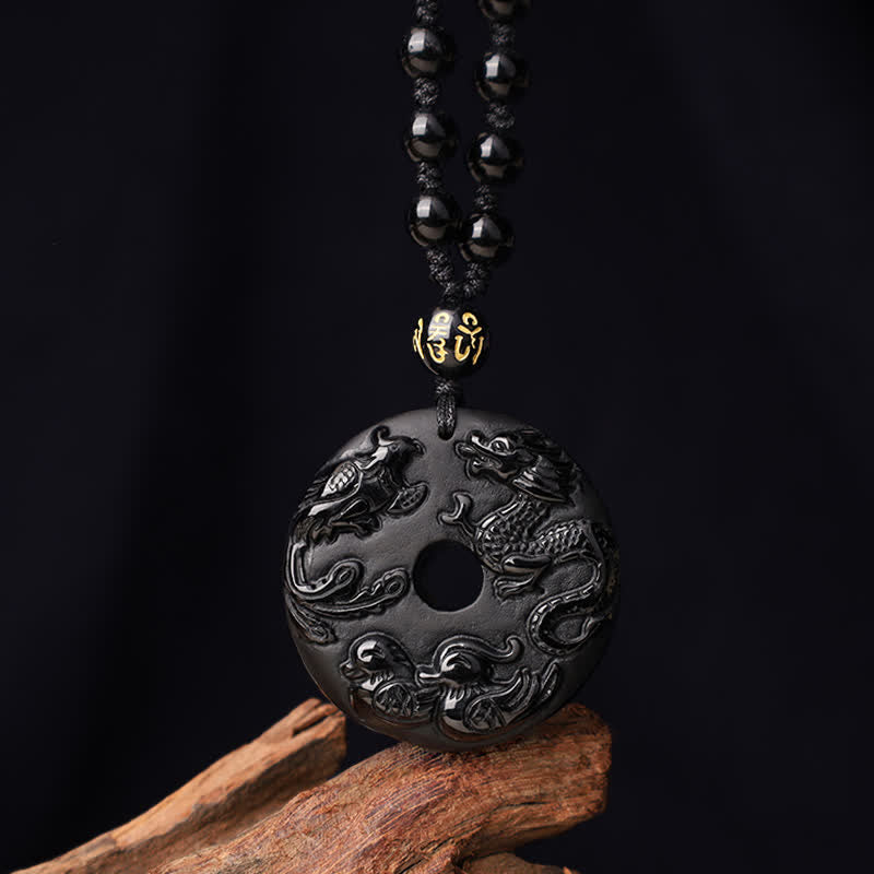 Black Obsidian Dragon Phoenix Pendant - Carved dragon and phoenix bi-disc on wood branch with beaded cord, Protection