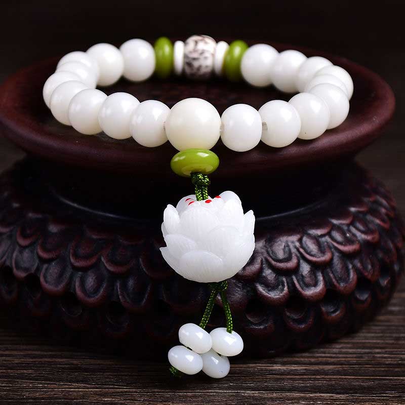 Lotus Bodhi Seed Bracelet – White beads with green accents and carved lotus pendant, natural meditation jewelry
