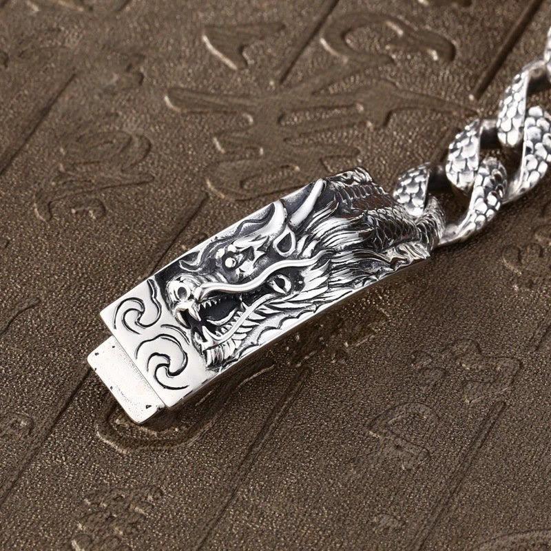 Dragon Scale Bracelet - scale-textured chain on antique chest, gothic, striking
