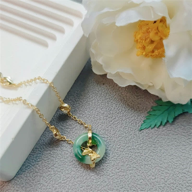 Cyan Jade Koi Fish Bracelet - worn on wrist showing fit and cyan color against skin tone