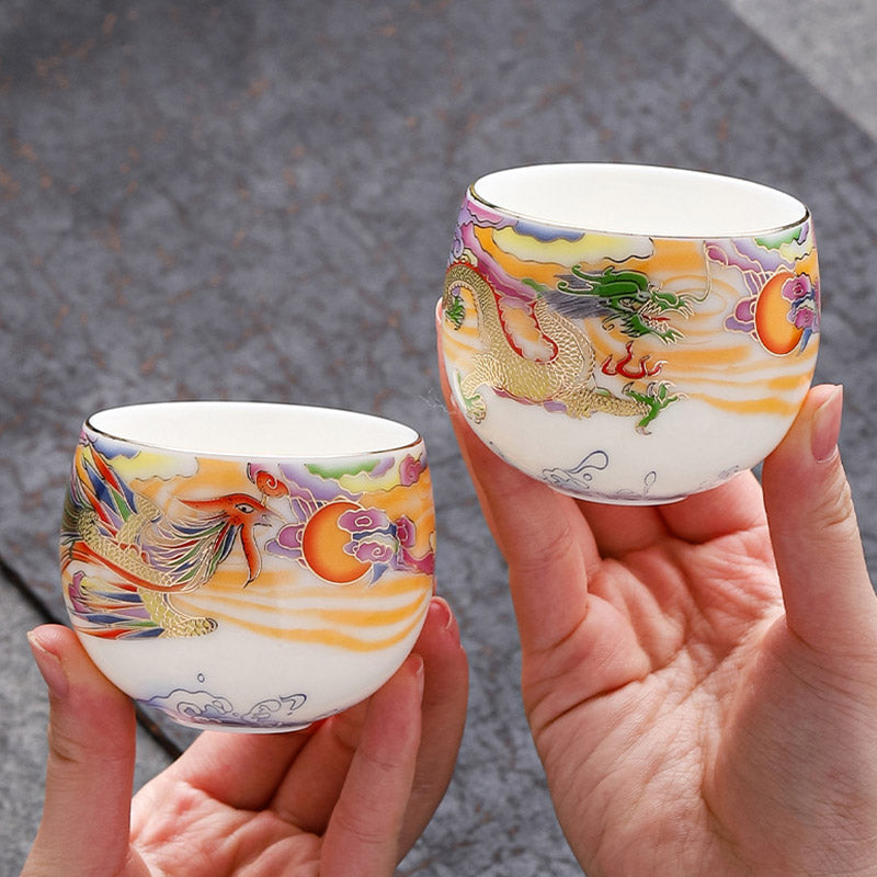 Dragon Phoenix Ceramic Teacup - Dragon and phoenix pair against gray stone, heritage