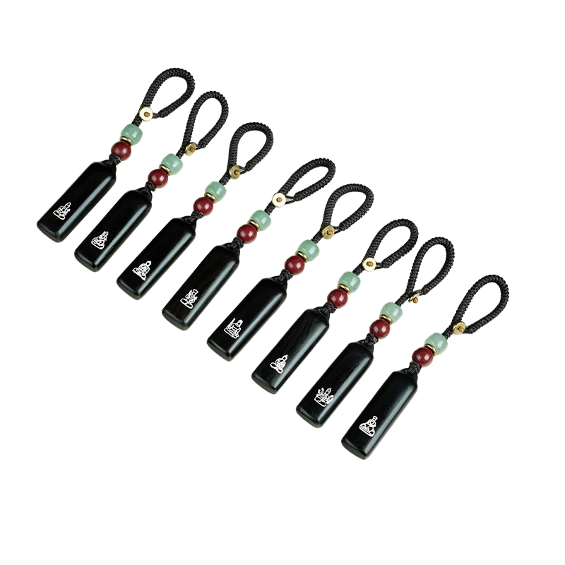 Ebony Eight Guardians talisman keychain with silver inlay for Rat zodiac Buddhist protection