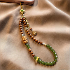 Chalcedony & Sandalwood Fu Bag Phone Charm – Green, angled view