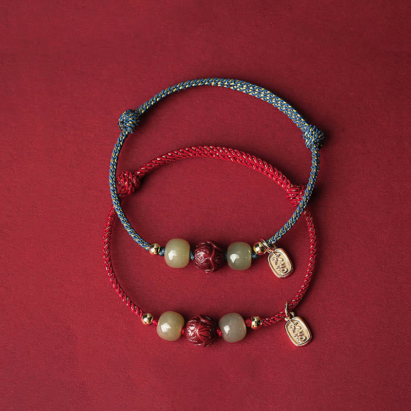 Hetian Jade Cinnabar Lotus Bracelet – Blue and red cord color options shown together on dark red, two tone bracelet