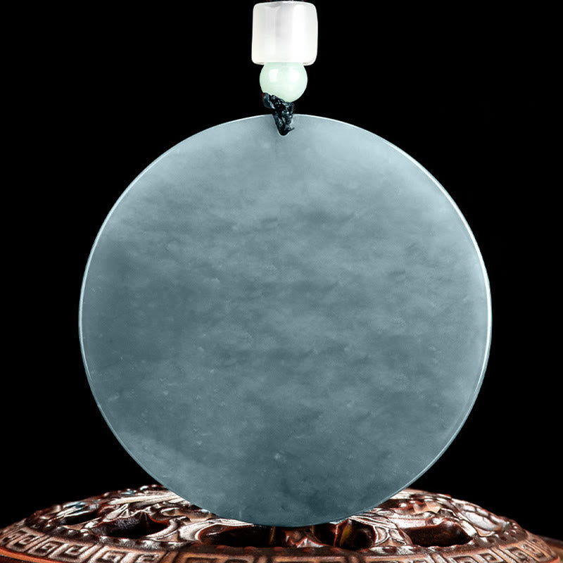 Kwan Yin Jade String Necklace – reverse side of plain jade bi disc on carved wooden stand, displaying natural stone texture and milky interior, authenticity showcase