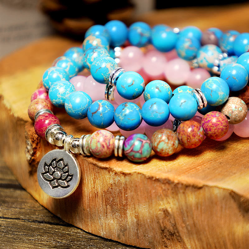 Tibetan Purple Miano Bead Lotus Mala - macro turquoise beads and silver lotus charm detail, gemstone mala