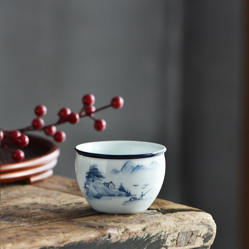 Koi Landscape Teacup – Flat lay with tea strainer and bamboo tray