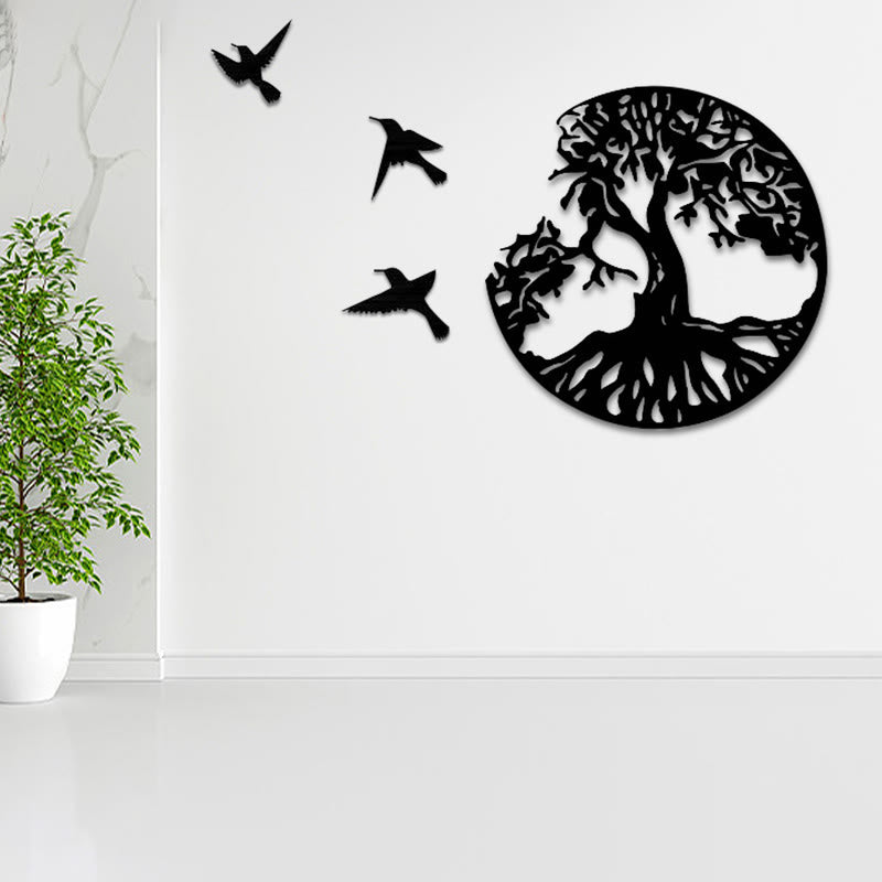 Tree of Life Birds Wall Art - black tree with three birds on white wall beside marble panel and potted tree