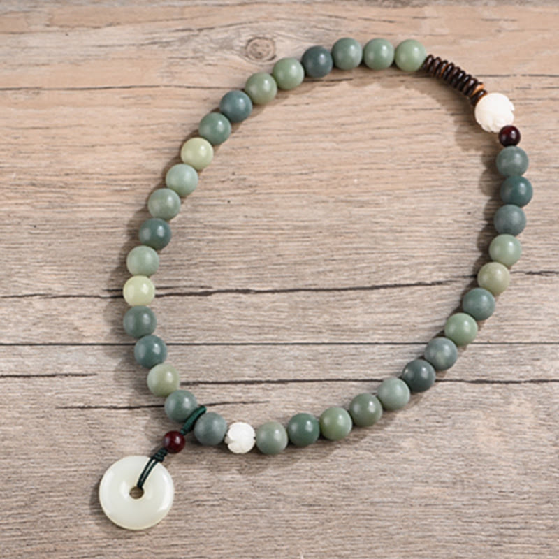 Cyan Bodhi Seed Jade Peace Buckle Bracelet - sage green bodhi beads flat-lay, natural stone texture
