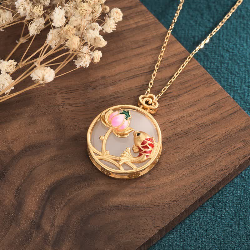 White Jade Koi Necklace – Lotus flower clasp detail where koi tail meets blossom, lotus koi necklace