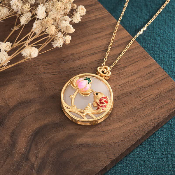 White Jade Koi Necklace – Lotus flower clasp detail where koi tail meets blossom, lotus koi necklace