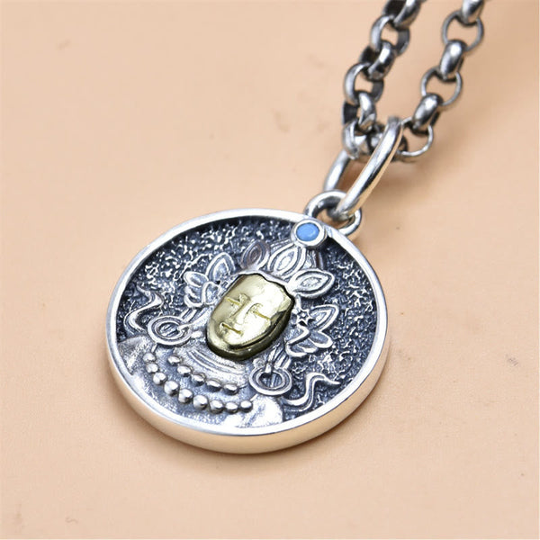 925 Sterling Silver Green Tara Necklace - Flat lay pendant on beige surface, detailed metalwork closeup