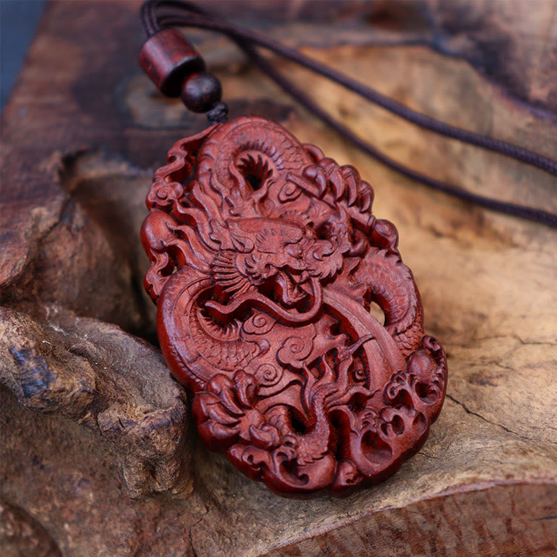 Lightning Jujube Wood Dragon Pendant - Elevated view of dragon scales and openwork depth, Artisan