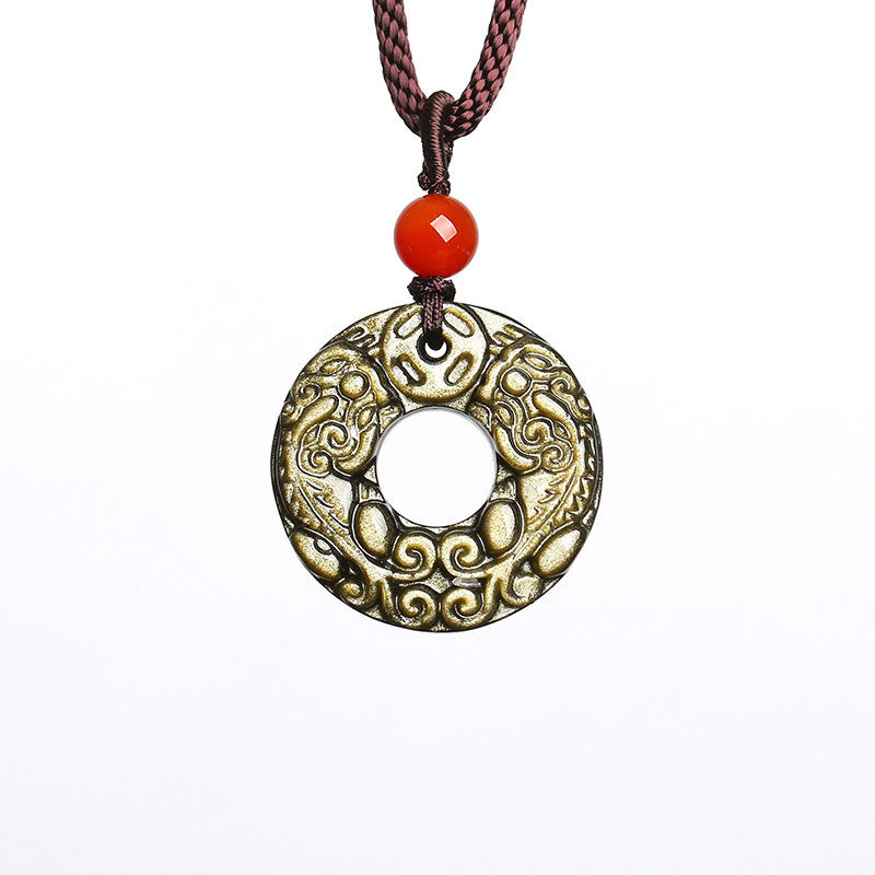 Peace Buckle PiXiu Necklace – Isolated gold sheen obsidian PiXiu disc pendant with red bead on white, wealth gift