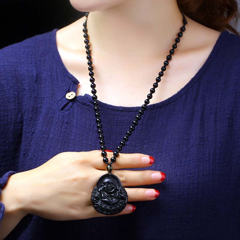 Black Obsidian Laughing Buddha Pendant Necklace – model wearing black obsidian pendant, navy top – model-wear, style