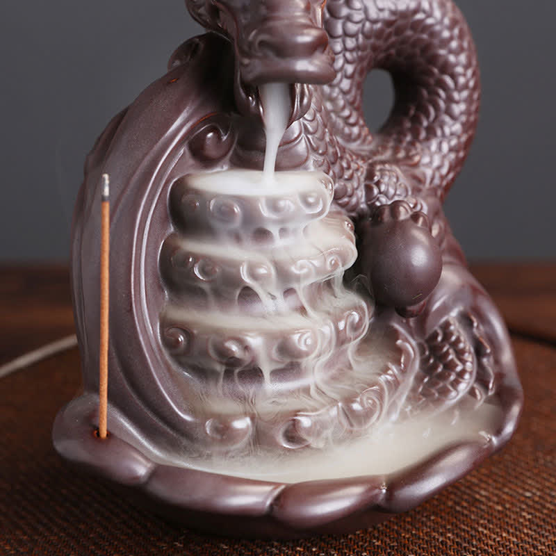 Dragon Pattern Ceramic Incense Burner – low angle close-up of dragon head with lit cone, Aromatherapy