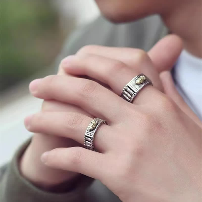 Feng Shui PiXiu Wealth Prayer Wheels Couple Ring – couple wearing matching rings on intertwined hands, romantic feng shui wealth jewelry