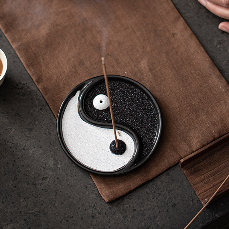 Yin Yang Incense Holder – Ceramic incense tray with rising smoke on brown fabric mat, Calm