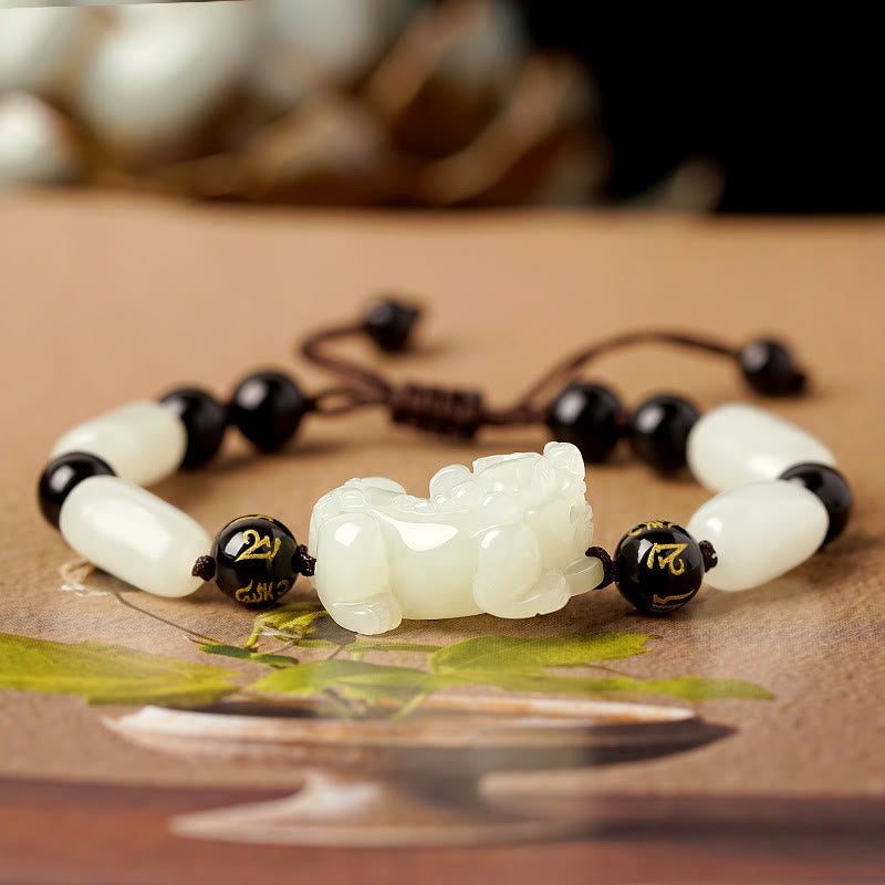 Hetian White Jade PiXiu Bracelet – Carved white jade PiXiu with gold-inscribed black beads