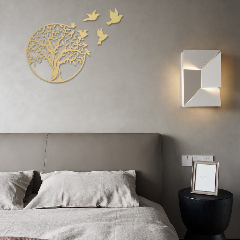 Tree of Life Birds Metal Wall Art - gold tree with birds and white sconce in bedroom with linen bedding