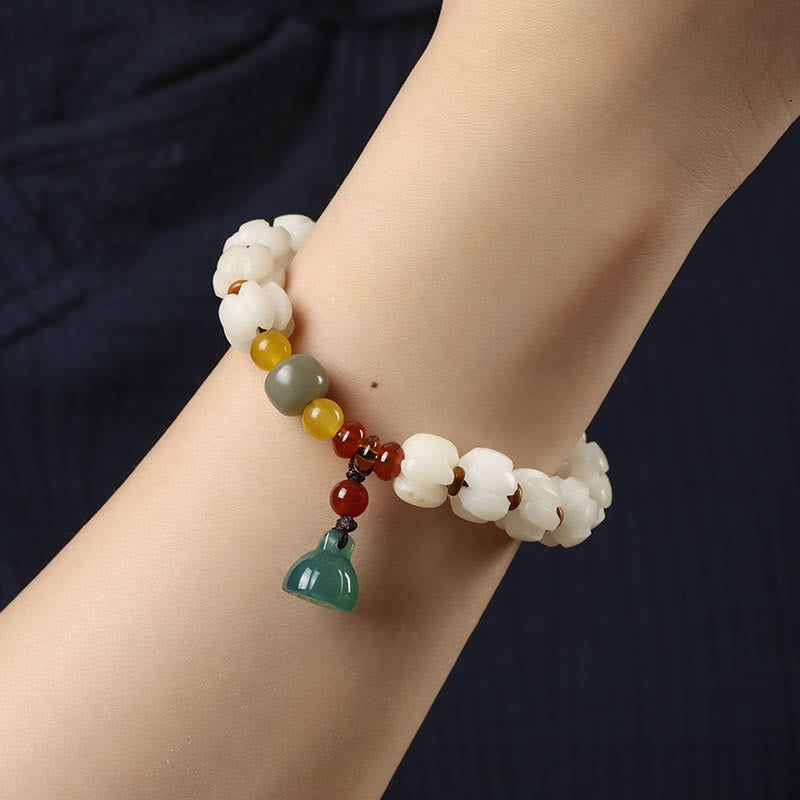 Bodhi Seed Lotus Bead Bracelet - wrist shot, lotus seed beads with jade charm