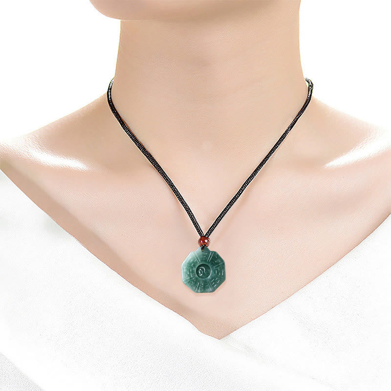 Natural Jade Bagua Yin Yang Pendant - Jade bagua necklace on mannequin bust, yin-yang pendant necklace