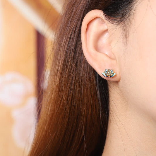 Hetian Cyan Jade Lotus Earrings - Worn on ear showing blue enamel petals and gold setting, lotus jewelry