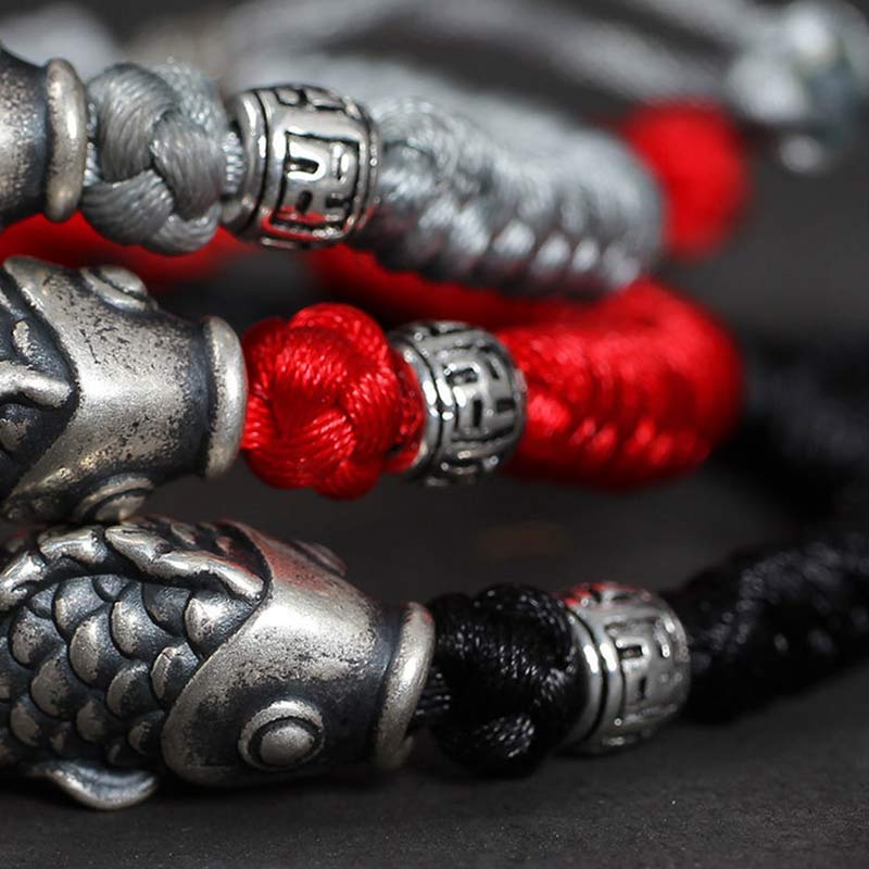 999 Silver Koi Fish Red String Bracelet – bracelet on display stand, elegant lucky charm jewelry