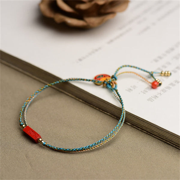 Cinnabar Bracelet - Adjustable braided cord with enamel charm on book, mindfulness jewelry