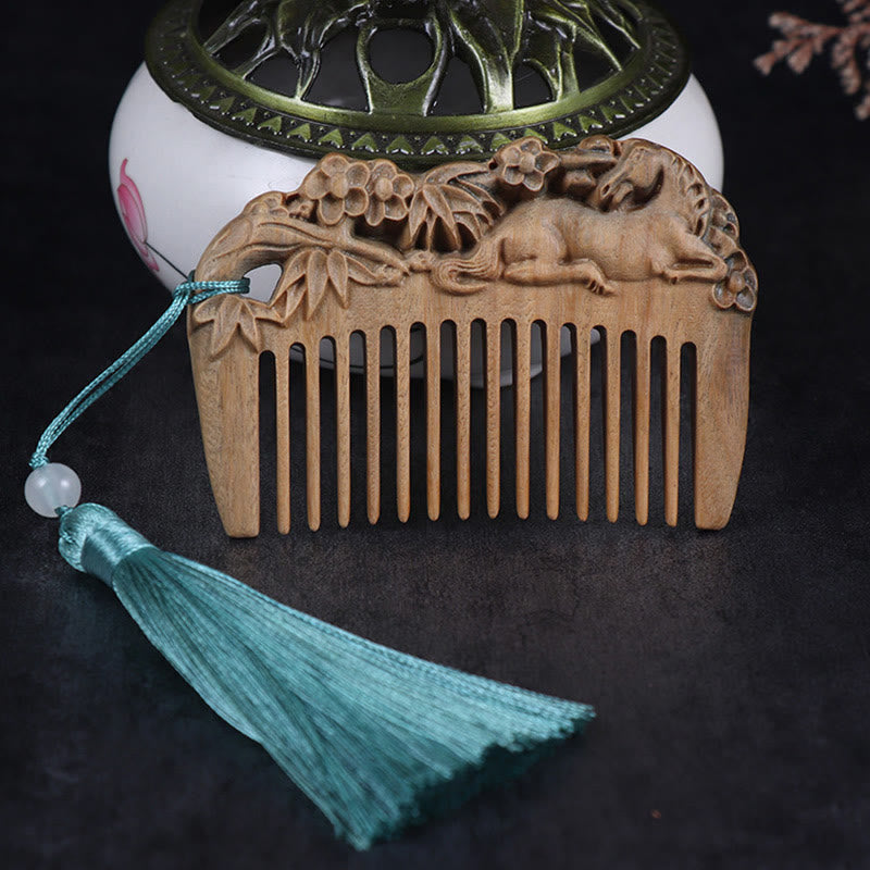 Green sandalwood horse peony comb with blue tassel against dark background