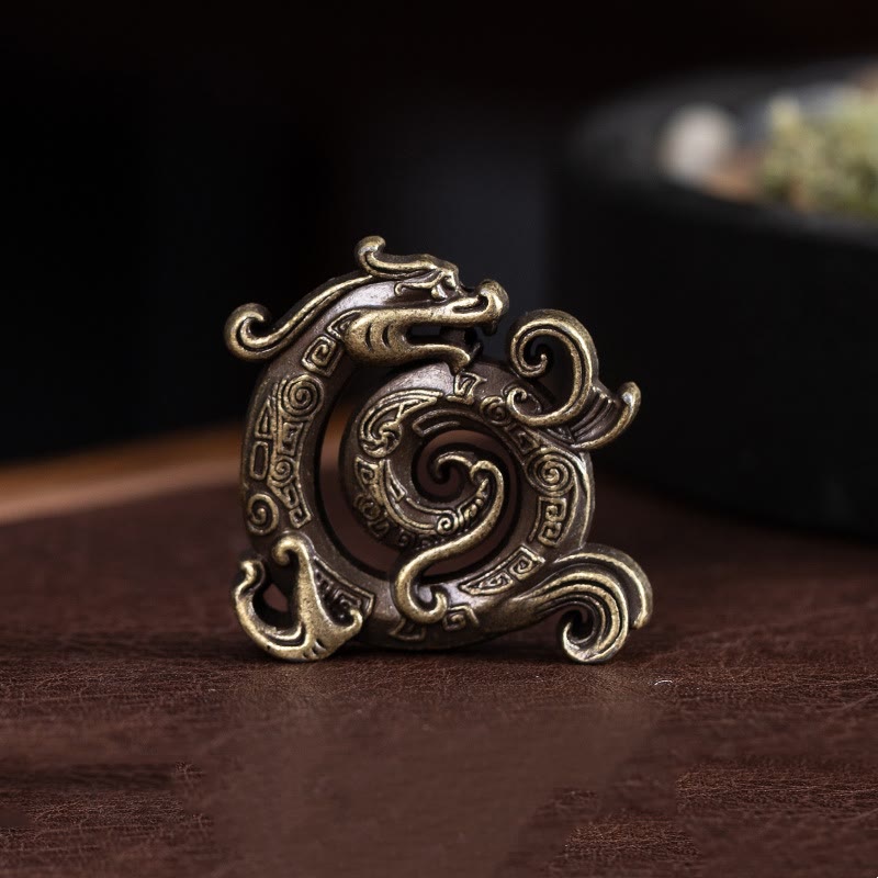 Mini Dragon Incense Burner – Antique brass dragon figurine with coiled ouroboros design on brown leather, Heritage