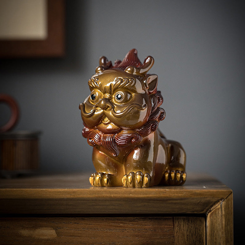 Small PiXiu Tea Pet – Gold PiXiu on wooden cabinet with teapot in soft background, home decor