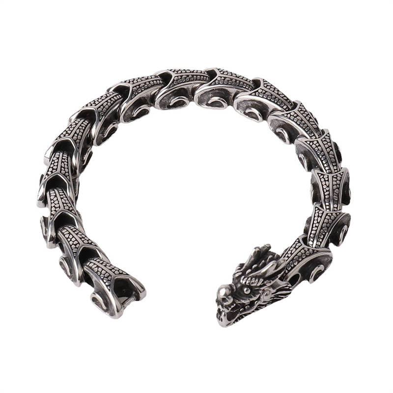 Dragon Titanium Steel Luck Bracelet Bangle - flat top-down view showing full open design and scale engraving, protective