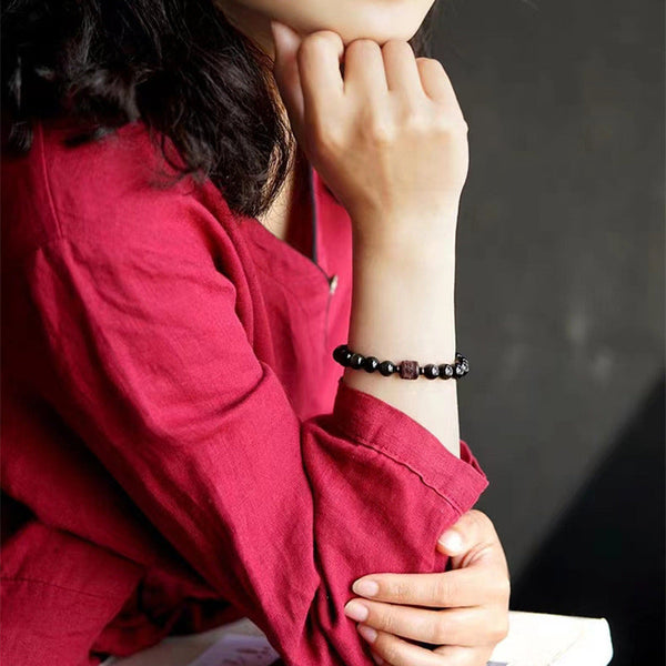 Gold Sheen & Rainbow Obsidian Fu Bracelet – styled with rolled red sleeve, mens bead bracelet