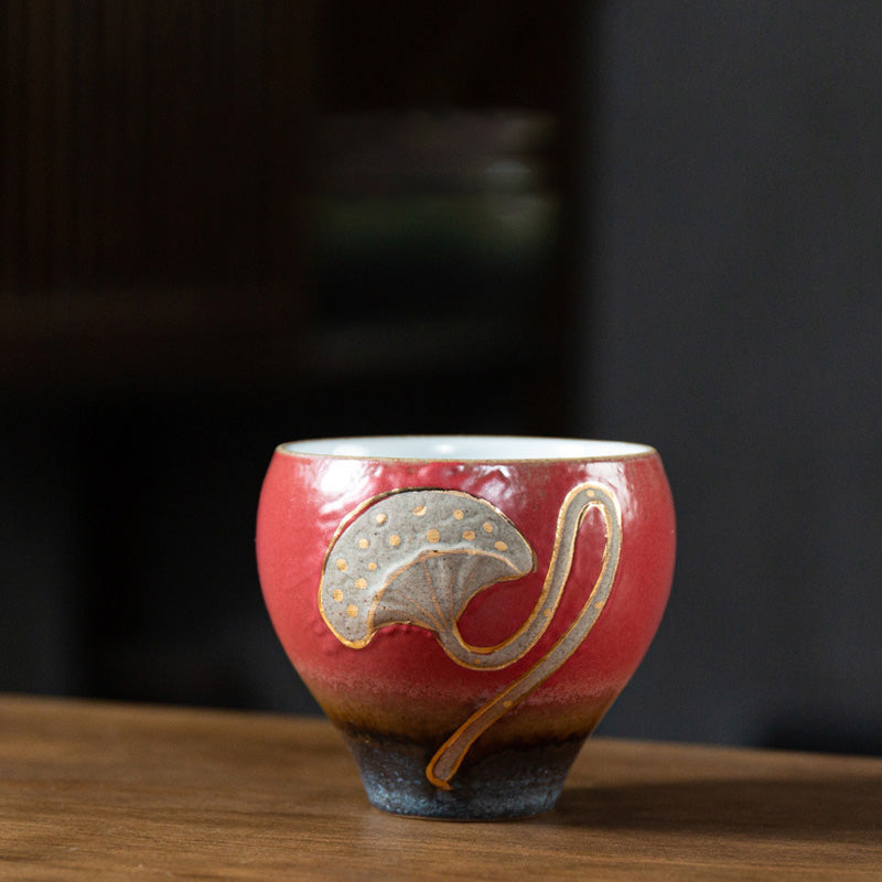 Lotus Pod Ceramic Kung Fu Tea Cup - Crimson red glaze with gold-dotted ginkgo leaf, handcrafted