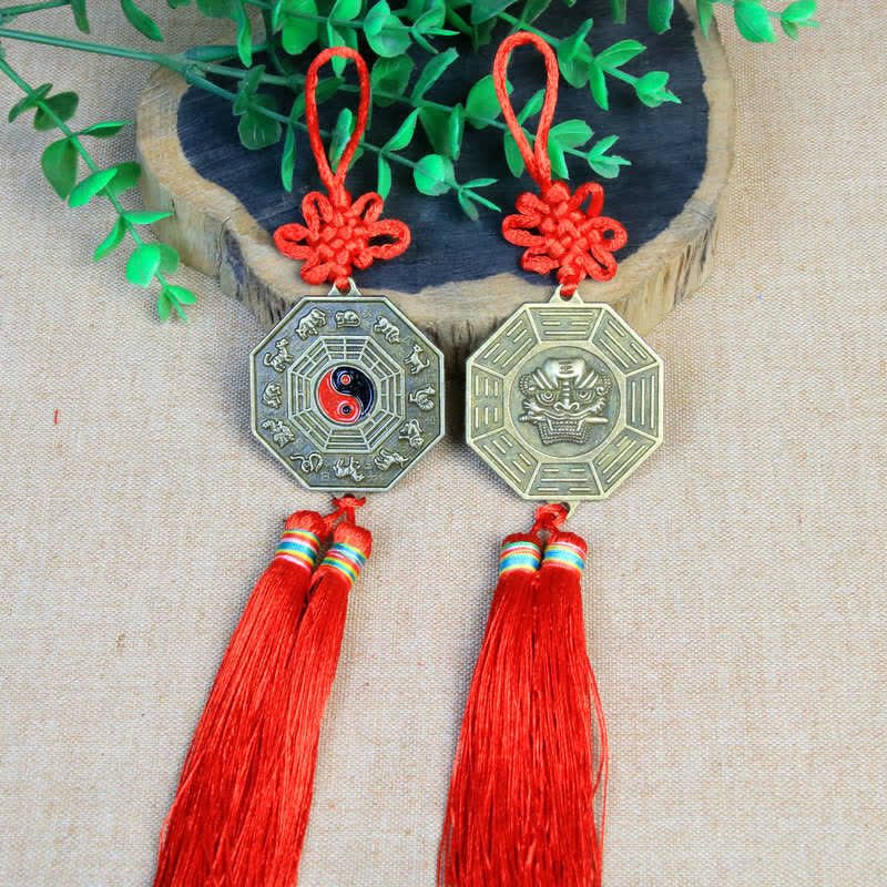 Feng Shui Bagua Map Mirror - Pair of bagua mirror amulets with yin-yang, zodiac animals and Foo dog design, red knots and ta.
