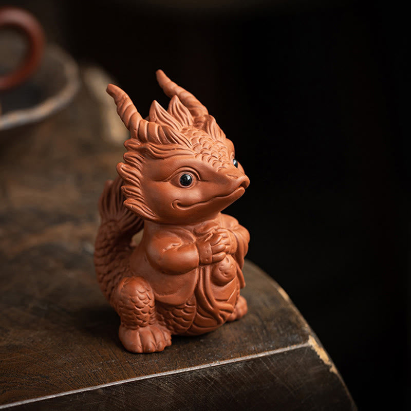 Luck Dragon Purple Clay Tea Pet - praying dragon on rustic wood, traditional craftsmanship
