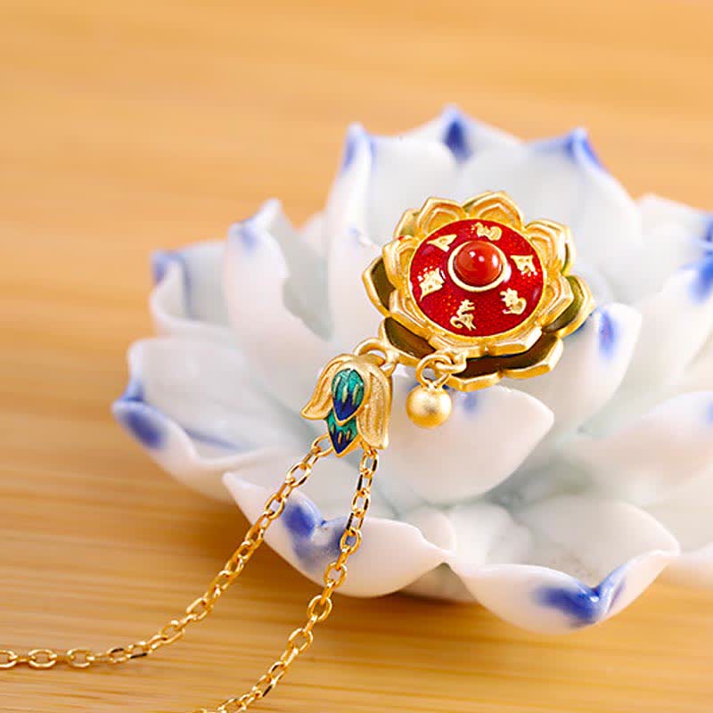 Silver Red Agate Lotus Necklace – prayer wheel pendant on porcelain lotus stand, spiritual awakening