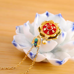 Silver Red Agate Lotus Necklace – prayer wheel pendant on porcelain lotus stand, spiritual awakening