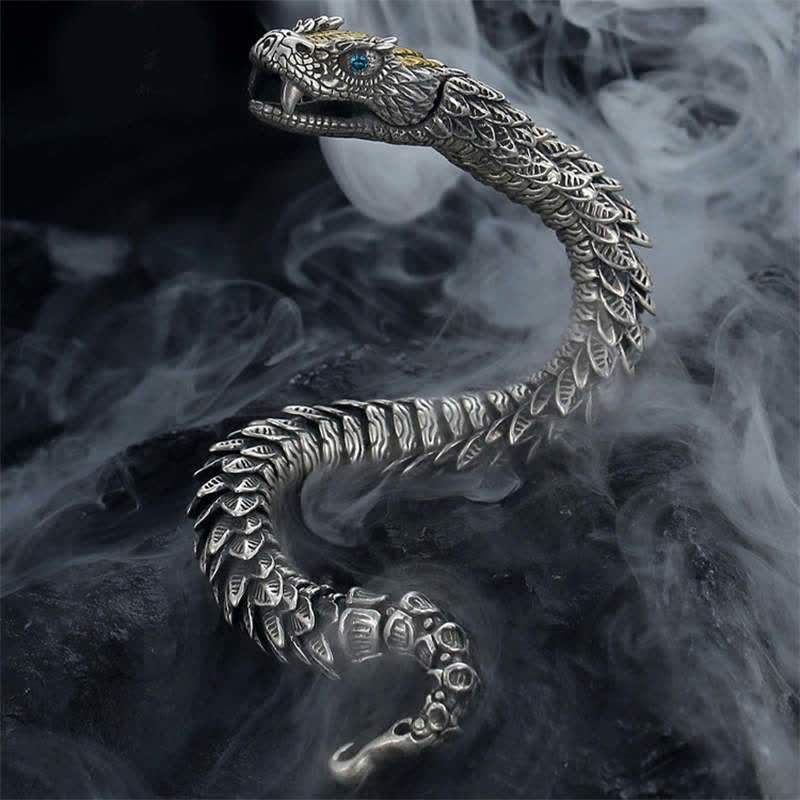 Dragon Snake Copper Bracelet – Coiled serpent cuff with golden crown and blue eye amid swirling smoke, Bold