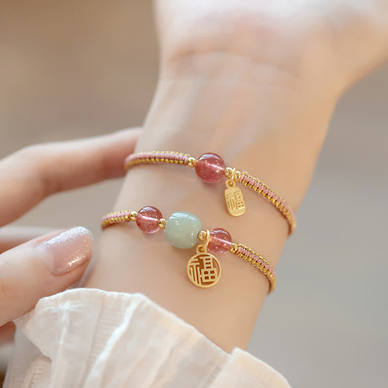 Red Agate Jade Lotus Bracelet – blue-gray cord with carved white chalcedony flower and lotus pod charm, lifestyle wrist photo