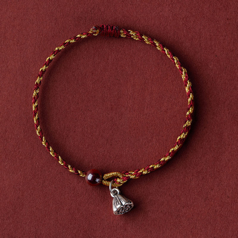 Red Gold Rope Lotus Braid Bracelet - top-down silver lotus seed pod close-up, braided jewelry