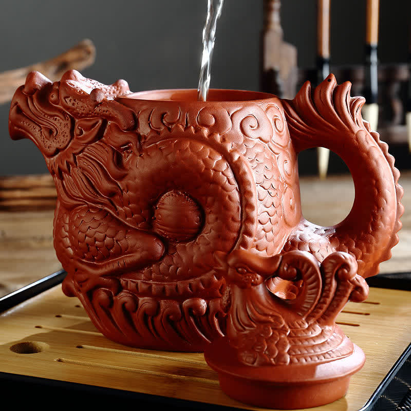 Vintage Dragon Phoenix Purple Clay Teapot – terracotta dragon teapot with water stream showing functional use, traditional...