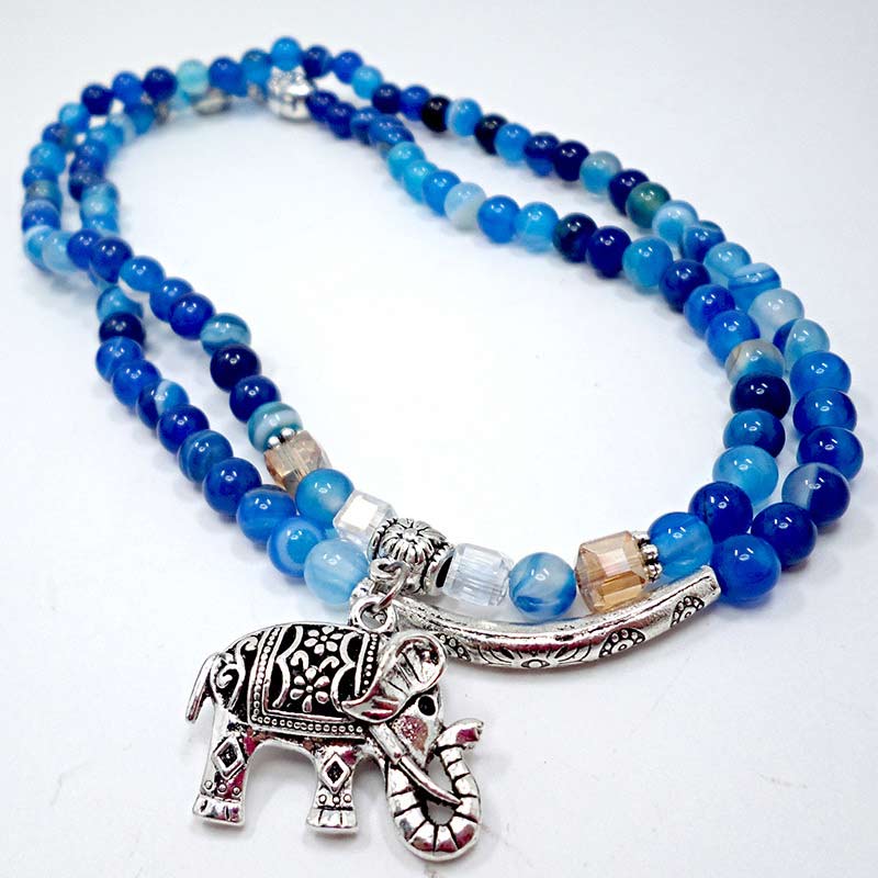 Natural Agate Elephant Buddha Bracelet – full length flatlay blue agate with elephant charm, flatlay