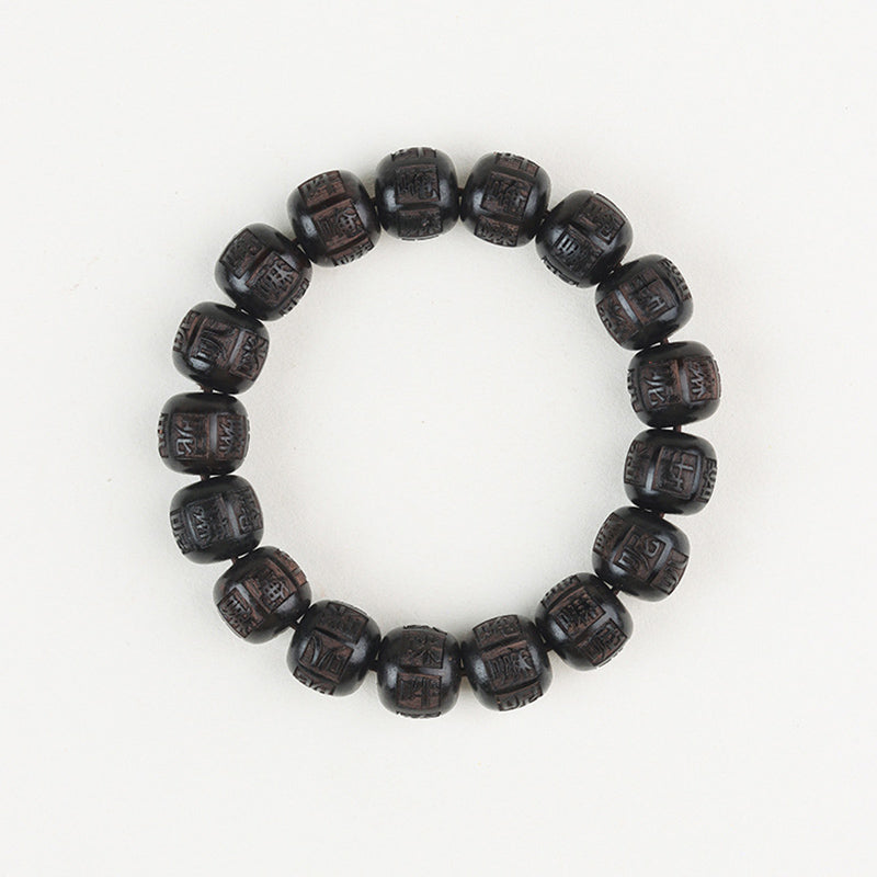 Ebony Wood Mantra Bracelet – Overhead view of full circular bead arrangement on pure white, prayer beads