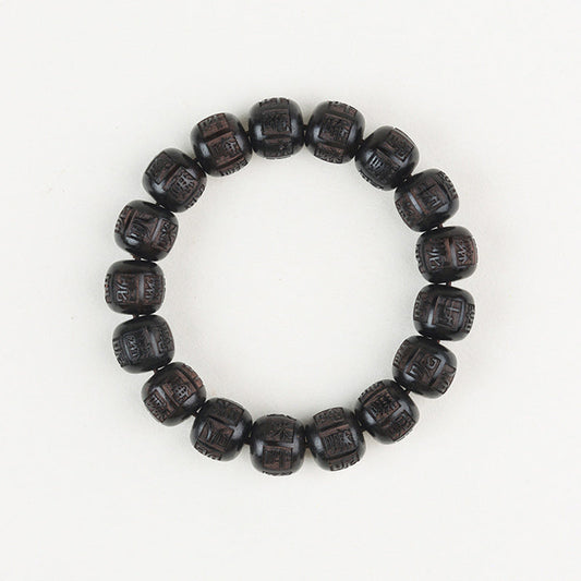 Ebony Wood Mantra Bracelet – Overhead view of full circular bead arrangement on pure white, prayer beads